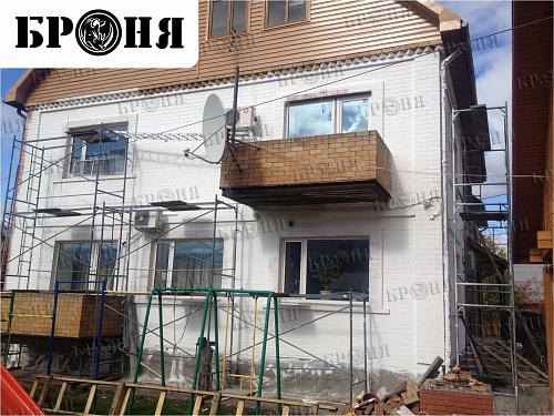 Thermal insulation Bronya and Gydrophobizator Bronya on the facade of a cottage in Khanty-Mansiysk (photo)