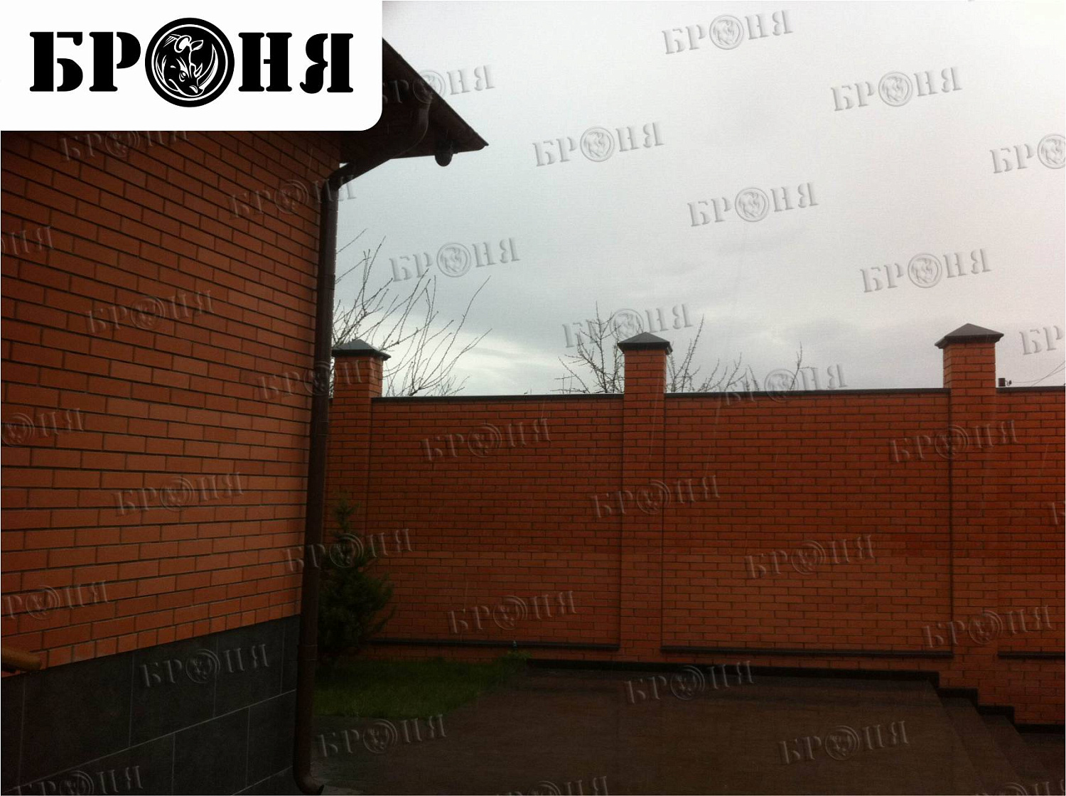 Volgograd, "Bronya Hydrophobisator" - walls and brick fence of a private house